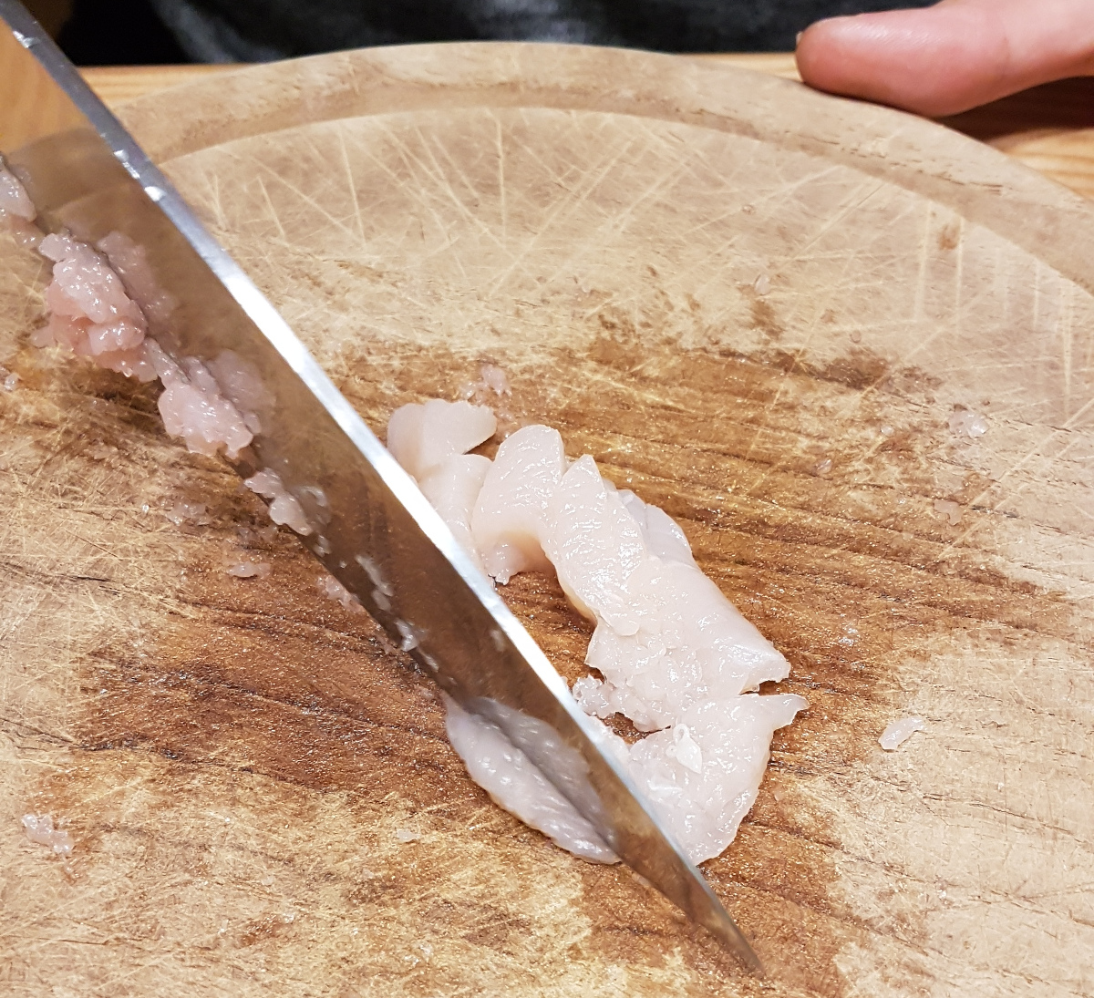 Chop chicken into fine pieces