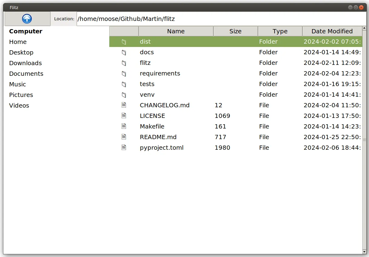 A file explorer with an up-button, a URL bar showing the current path, and a details view showing the content of the current directory.